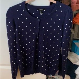 Light knitted doted sweater